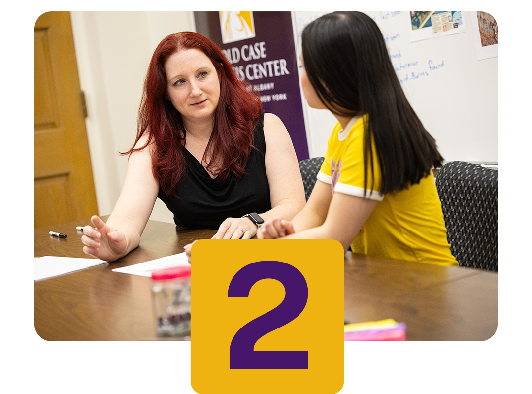 Student and advisor working together.