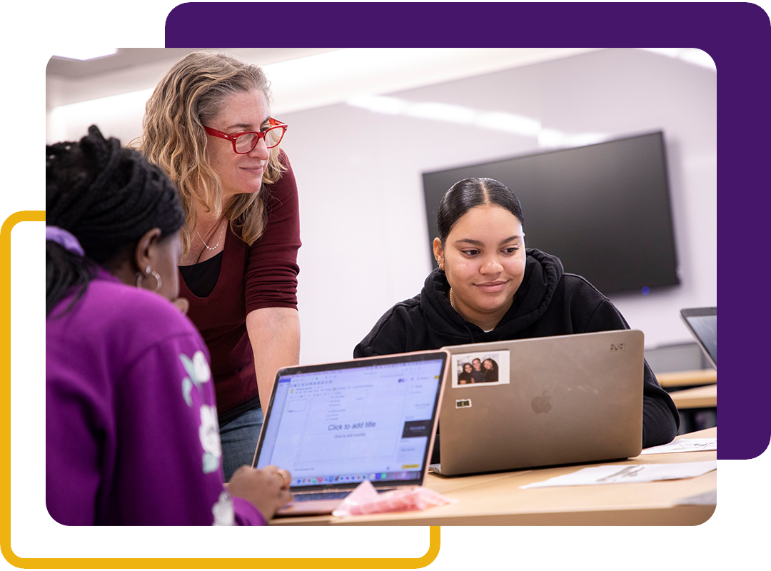 Two students and a professor working together.