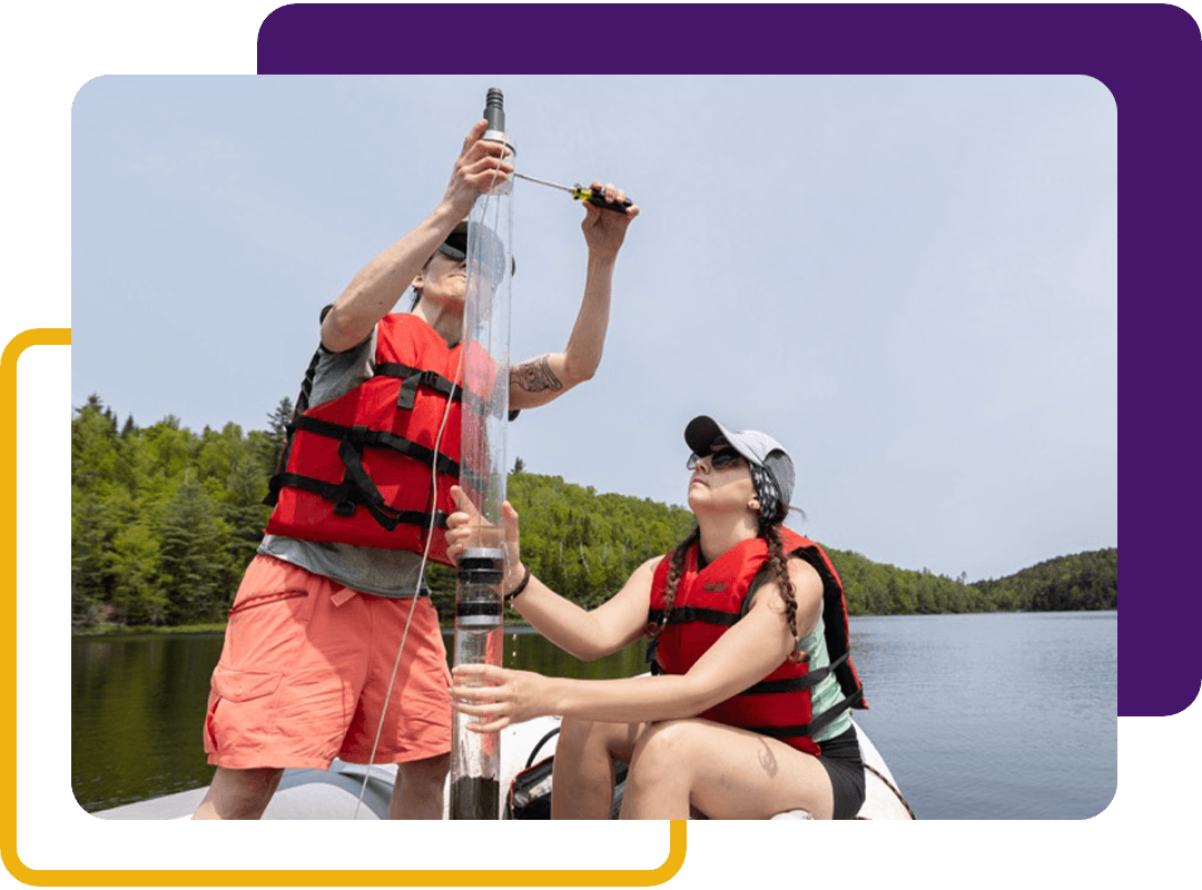 Students on a boat conducting research.
